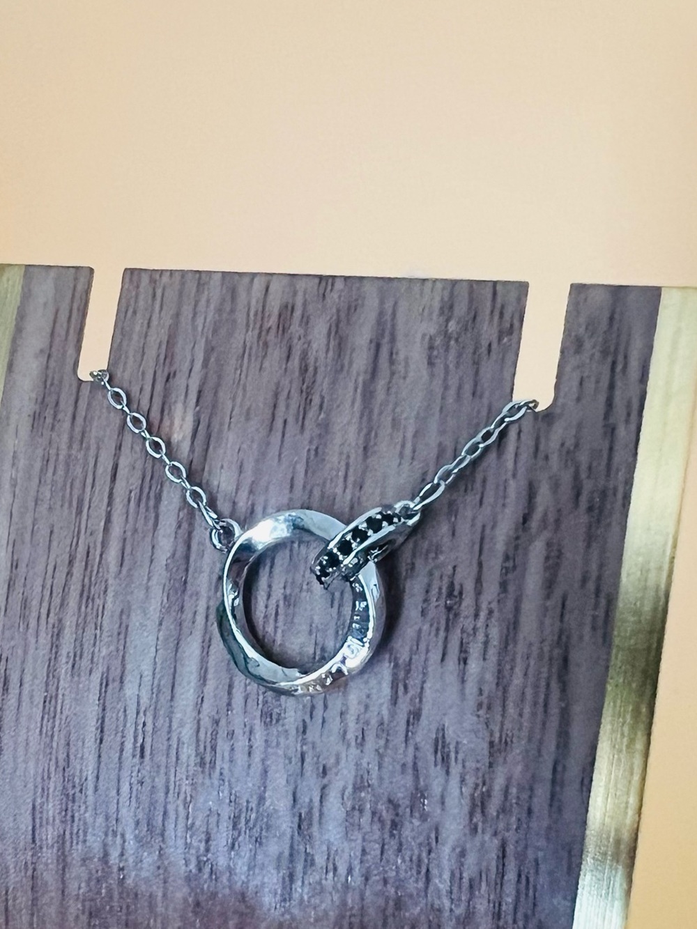 Elegant Silver Necklace with Interlocking Circles “FALL IN LOVE” message